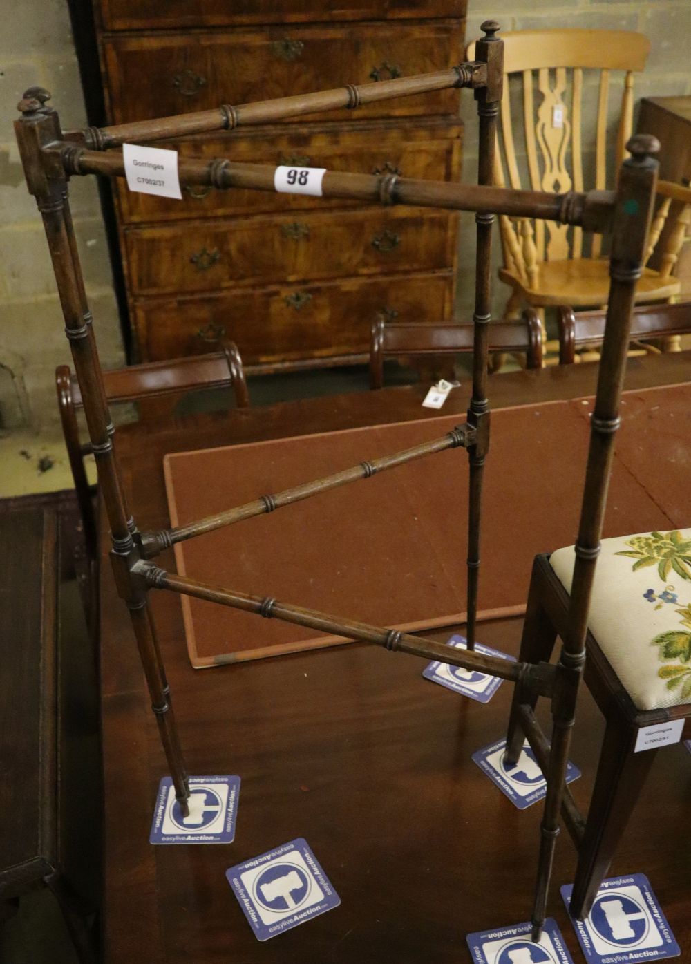 A 19th century turned mahogany folding towel rail, height 77cm